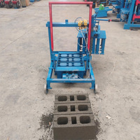 Petite machine automatique de fabrication de pavés et de blocs creux BL 2-45 avec moteur et engrenages pour matériaux bruts en béton, sable, pierre et ciment