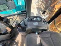 Tersedia 130 jam 590 Backhoe Loader Bekas dengan Kontrol Jarak Jauh Hidrolik Proporsional Industri untuk Konstruksi