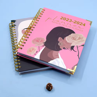 Carnet de Manifestation et d'Objectifs Rose Spirale Personnalisé avec Logo 2026-2027 – Agenda Hebdomadaire et Mensuel A5 – Fabricant