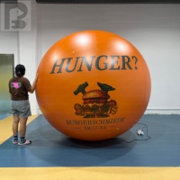 Ballon publicitaire géant rond en PVC, imprimé sur mesure, hermétique et scellé à l'air, pour la promotion de marques alimentaires lors d'événements