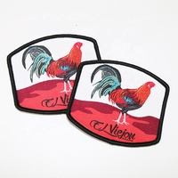 Fabricant chinois Marque personnalisée Conception animale Merrow Edge Fer sur étiquettes Étiquettes de vêtements tissés Patchs pour chapeaux