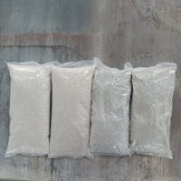 Masterbatch d'oxyde de calcium de qualité filmique à haute pureté (98 %) en poudre, anti-mousse/désiccant, en emballage sous vide/souple, à base de matériaux recyclés