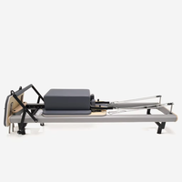 Reformer de Pilates en alliage d'aluminium anatomique avec ressorts allemands, vente en gros pour studios et salles de sport commerciales, pour renforcer les muscles profonds