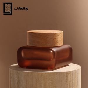 مجموعة تغليف مستحضرات التجميل الفاخرة جرة كريم زجاجي العنبر 50 جرام مع غطاء من خشب الخيزران - Product Image 1