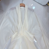 Robe longue bouffante à col en V profond et manches lanternes en maille décontractée de haute qualité OUDINA pour femmes