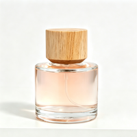 Flacon de parfum cylindrique en verre de 50 ml avec vaporisateur et couvercle en bois massif, flacon vide minimaliste pour parfum