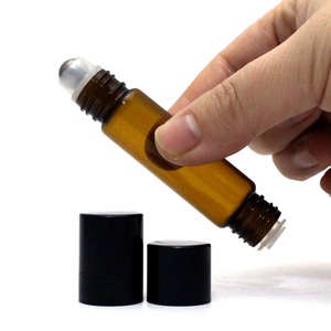 Botella de Vidrio Ámbar Transparente <span class=keywords><strong>para</strong></span> Aceites Esenciales con <span class=keywords><strong>Rodillo</strong></span> y Gotero Dorado Mate, Más Vendida - Product Image 1
