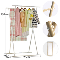 Vente en gros de supports portables pliables en métal à double pôle pour le séchage des vêtements d'intérieur et d'extérieur avec séchoir pour balcon et salle de bain