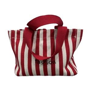 Sacs fourre-tout pour femmes en toile et cuir écologique de haute qualité OEM, tendance, vente en gros, logo personnalisable, doubles poignées, rivets ouverts, broderie - Product Image 5