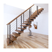 Escalier moderne à poutre monobloc en acier, marches flottantes en chêne, balustrade en verre
