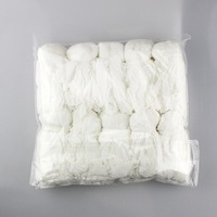 Chaussettes jetables non tissées avec poignée antidérapante Chaussettes à usage unique pour services de location 50 paires/sac Chaussettes couvre-pieds