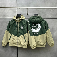 Veste coupe-vent à capuche bicolore pour homme, imprimé graphique double face, fermeture éclair, style vintage streetwear décontracté