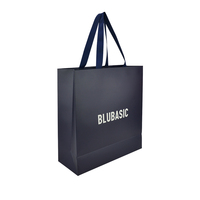 Sacs cadeaux de luxe personnalisés en papier écologique avec logo imprimé pour boutiques de vêtements et de détail, avec poignées en ruban