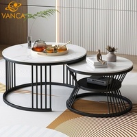 Ensemble de tables basses mobiles, plateau rond en pierre frittée, base en métal noir artistique, table d'appoint décorative moderne pour salon et maison