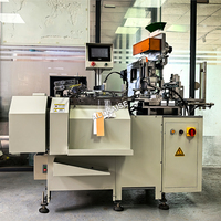 Etiquette volante automatique pour vêtements Machine à nouer les nœuds en nylon Etiquette à oeillet Machine à enfiler les nœuds Chaîne d'étiquettes volantes