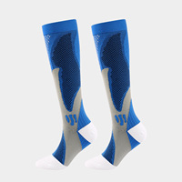 Vente en gros de chaussettes de football personnalisées Chaussettes de football d'élite Chaussettes de sport pour hommes avec logo personnalisé Jacquard à la mode