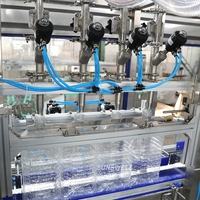 Machine de remplissage, de bouchage et d'emballage entièrement automatique pour bouteilles d'eau pure de 5 L avec commande PLC