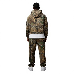 Conjunto de chándal con capucha y pantalones anchos de chándal, con diseño de estampado de jungla por sublimación, efecto vintage desgastado por el sol, estampado regular y estilo streetwear. - Product Image 2