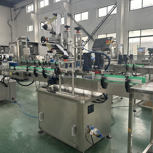 Étiqueteuse automatique de bouteilles pour timbre fiscal ou applicateur d'étiquettes autocollantes anti-voleur - Product Image 2