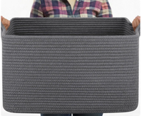 Panier de rangement tissé de grande capacité avec poignée, pratique pour le déménagement et l'organisation.