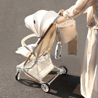 2025 Offre Spéciale personnalisé Portable poussette organisateur Flexible bébé coréen ours Doona poussette organisateur sac avec grande remise