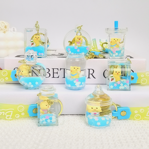 Llavero de Oso Amarillo Adorable con Líquido Flotante y Arena Movediza - Charm Acrílico Multiforma con Purpurina, Accesorio de Animal de Dibujos Animados al por Mayor - Product Image 1