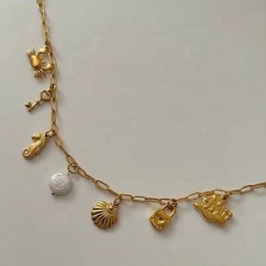 Collier Étanche en Acier Inoxydable Plaqué Or 18K PVD avec Pendentifs Tortue Marine, Étoile de Mer, Coquillage et Hippocampe pour Femme – Idéal Plage et Océan - Product Image 2