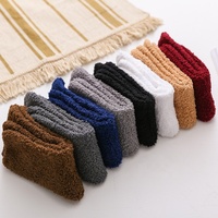 MINGZHI Chaussettes en peluche d'équipage de couleur unie chaudes pour l'hiver bon marché Logo personnalisé Vente en gros Chaussettes de sol en farine de corail Chaussettes confortables pour hommes