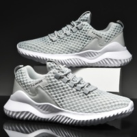 Chaussures de sport basses athlétiques en gros, tendance mode, baskets de course de créateur, en tissu respirant et extensible, légères pour l'entraînement