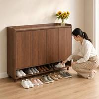 Meuble à chaussures en noyer au profil fin, 4 portes, 35 cm de profondeur, portes sans poignées, étagère ouverte, rangement d'entrée, design moderne du milieu du siècle