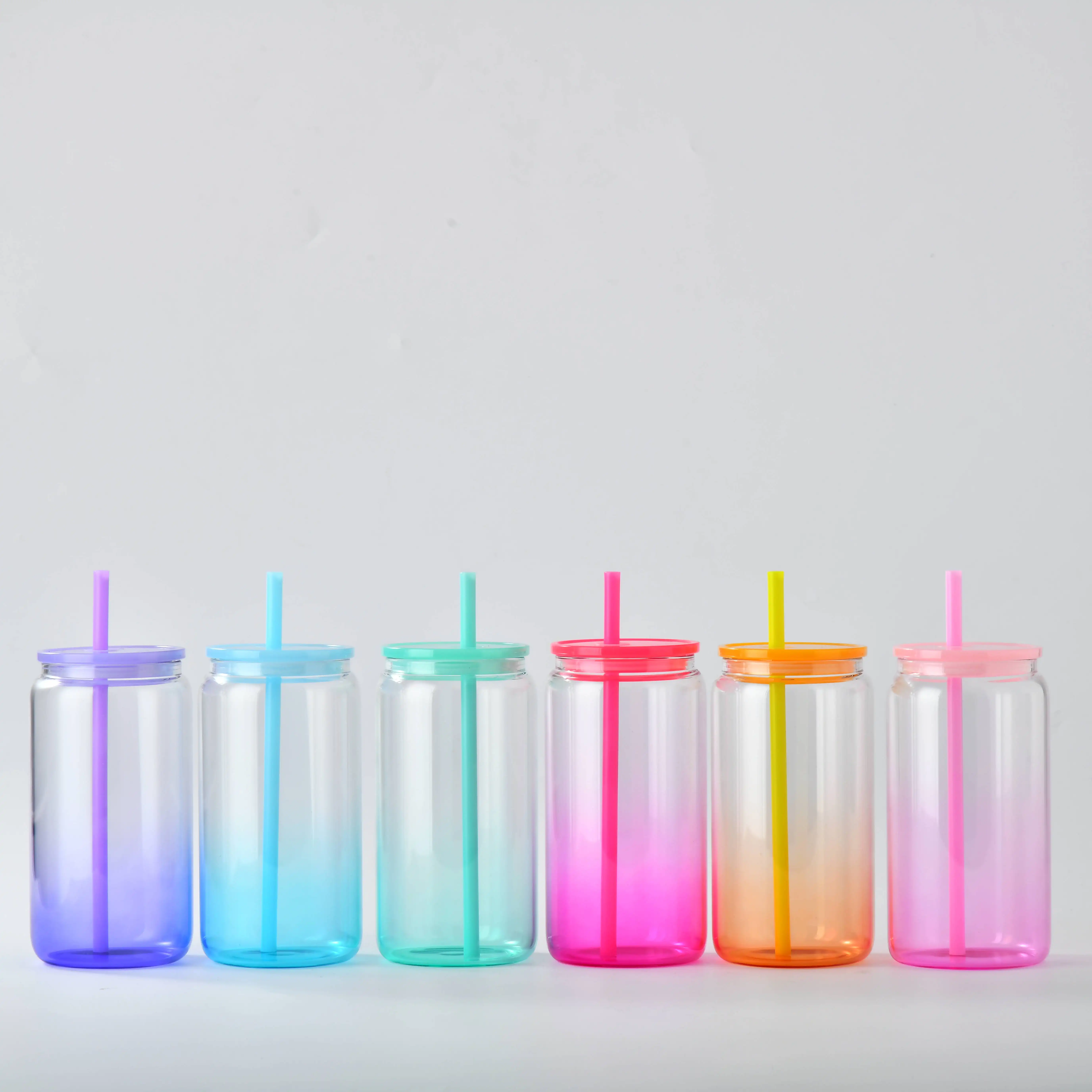 وعاء زجاجي بحجم 16 أونصة من المستودعات الأمريكية مع أغطية بلاستيكية ملونة وشفاطات