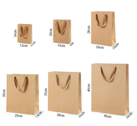 Sacs cadeaux en papier kraft personnalisés avec ruban et logo personnalisé pour vêtements