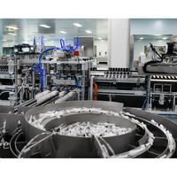 Ligne de production entièrement automatique OEM pour kits de perfusion jetables, machine d'assemblage de tubes de perfusion IV médicaux avec assemblage multi-stations
