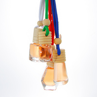 Bouteille de parfum pour voiture en verre vide OEM/ODM de 5 ml, 8 ml, 10 ml, diffuseur d'air pour voiture avec bouchon en bois