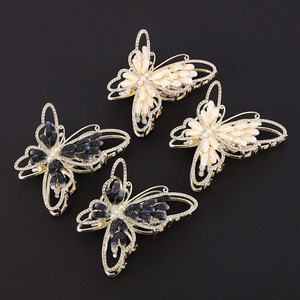 กิ๊บติดผมรูปผีเสื้อสีทองประดับด้วยพลอยเทียมสีดำเครื่องประดับศีรษะสำหรับงานปาร์ตี้ - Product Image 1