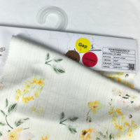 Tissu Jacquard Floral Pointelle Écologique en Jersey Côtelé 96,5% Polyester pour Pyjama Enfant – Grande Vente Européenne