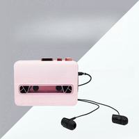 Lecteur de cassette rose rétro avec haut-parleur intégré, appareil audio portable vintage pour l'apprentissage à domicile