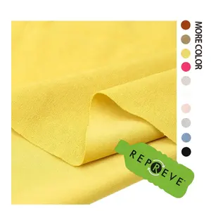 GRS personnalisé écologique recycle 100 polyester jaune interlock textile de tissu tricoté en crêpe de plongée durable pour les robes de vêtements