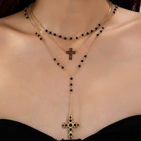 Vente en gros de colliers religieux avec croix gothique pour femmes chaîne exagérée à double couche avec grande perle en alliage de zinc plaqué or