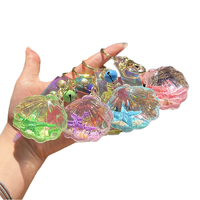 Porte-clés créatif en plastique en forme d'étoile de mer et de coquillage, pendentif tendance à paillettes liquides, souvenir, accessoires pour voiture et sac