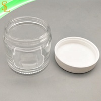 Pot en verre transparent vide de 2 oz (60 ml) avec bouchon à vis en plastique blanc nervuré, sérigraphie givrée pour crème pour le visage et crème de soin de la peau