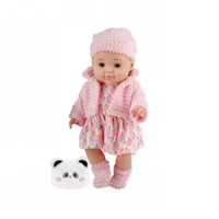 Geschenkset für Kinder Vollvinyl-Babypuppe Niedliche Neugeborenen-Puppe mit Mütze und Kleidung Rollenspielzeug mit Plüschtasche