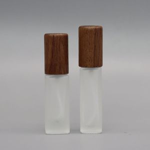 ขวดน้ำหอมแก้วฝ้า 5 มล. แบบพ่นสี่เหลี่ยมผืนผ้า พร้อมฝาไม้ พกพาสะดวก - Product Image 4