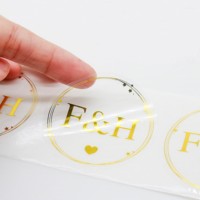 Etiquette personnalisée estampage de luxe de haute qualité pour produits en PET, impression d'autocollant de taille gaufré étanche pour vêtements