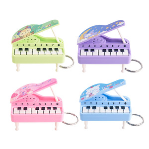 Llavero de piano miniatura de colores al por mayor, portátil y tocarable, juguete musical de 7 notas para mochila infantil, accesorios para llaves - Product Image 1