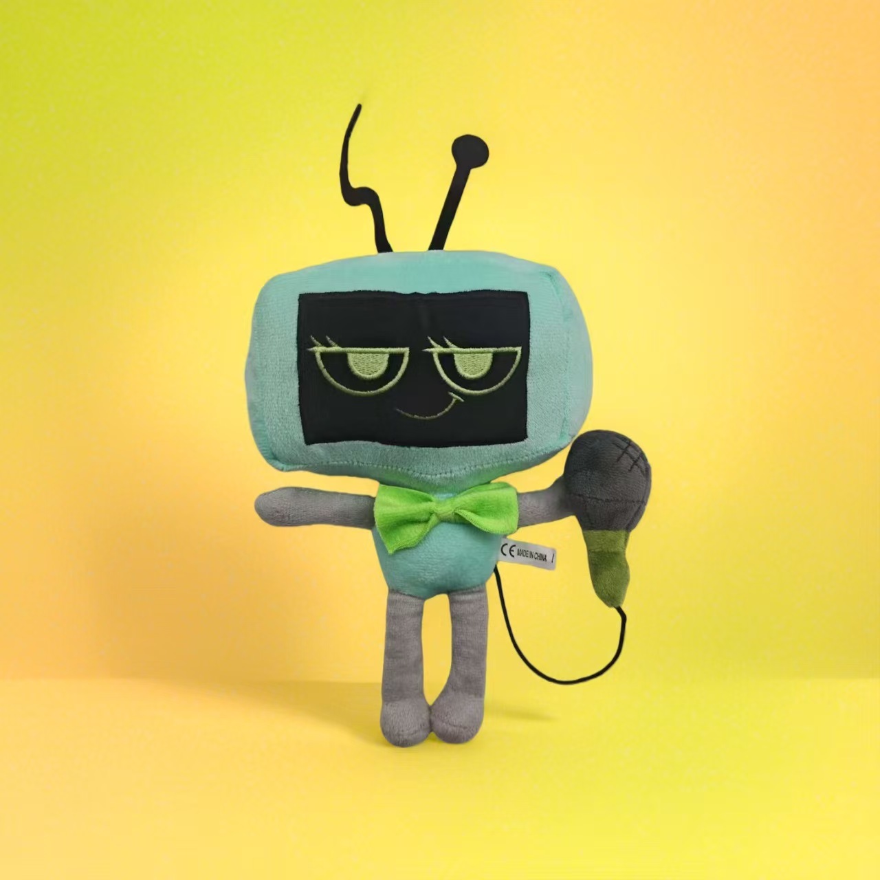 Magnetic microphone with green square head, 28 cm long