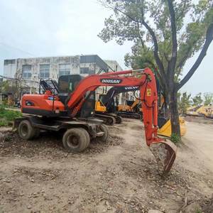 Excavatrice sur pneus hydraulique Doosan DX60W de 6 tonnes fabriquée en Corée du Sud avec moteur, pompe, roulement et moteur à vendre à Shanghai, Chine - Product Image 5