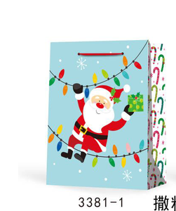 Sacs cadeaux en papier de Noël à cordon de serrage avec paillettes - Product Image 1