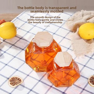 ขวดน้ำผึ้งแก้วใสทรงหกเหลี่ยมสูงสีขาวพร้อมฝาไม้ไผ่พร้อมแท่งคนผสม ดีไซน์ป้องกันการรั่วซึม ขนาด 380 มล. - Product Image 2