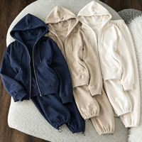 Ensemble jogging et sweat à capuche zippé en tissu éponge pour femme, en coton et élasthanne, coupe décontractée, couleur unie, survêtement long, vente en gros et approvisionnement en vrac